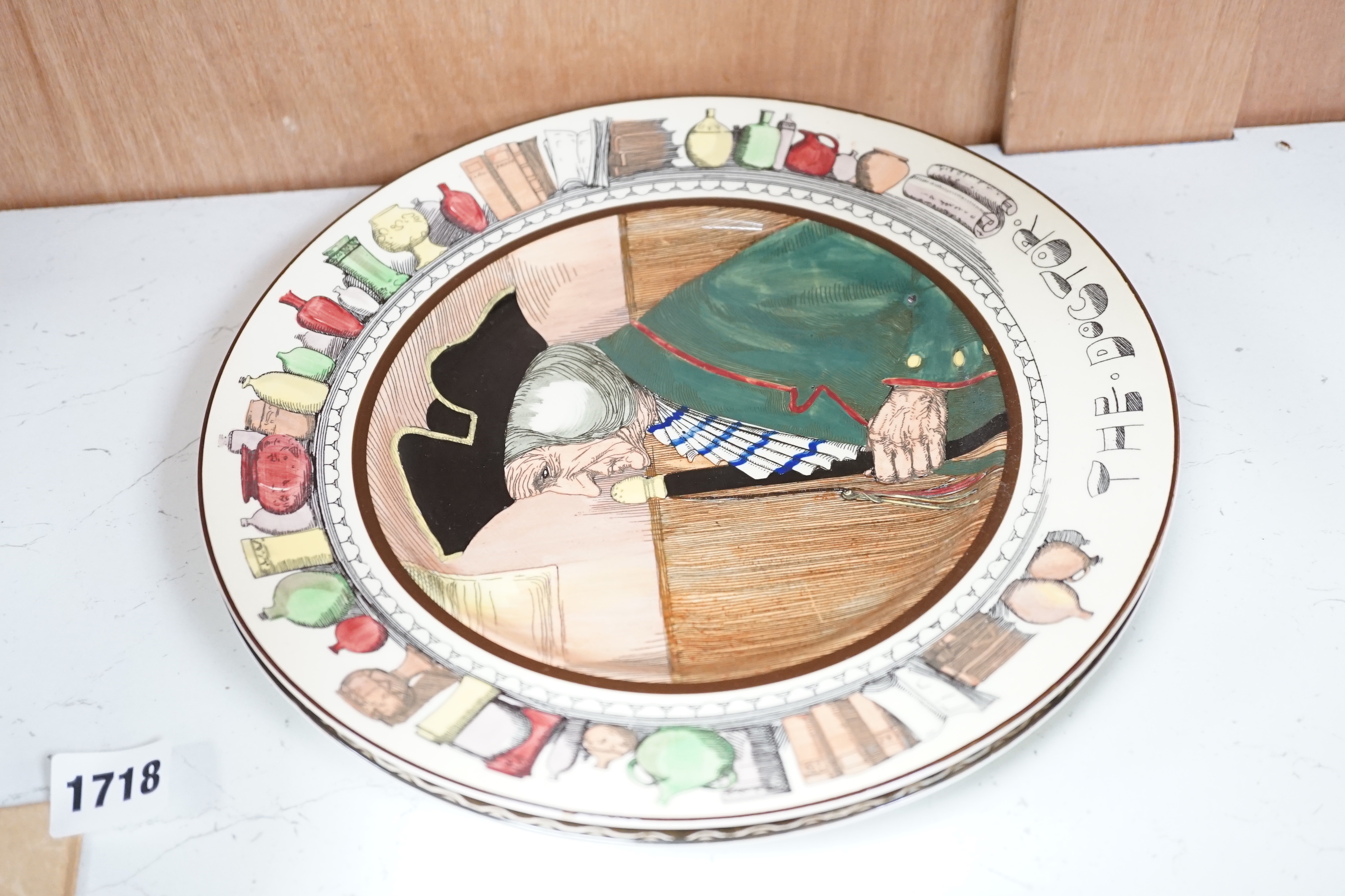 Eight Doulton “series” wall plates, approximately 26cm diameter